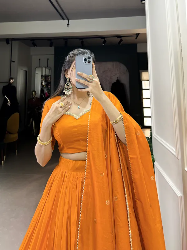 Crafted_for_Grace_and_Beauty:_Pure_Chanderi_Plain_Lehenga_with_Intricate_Zari_Work_Border,_Accompanied_by_Sequin_Embellished_Dupatta_??