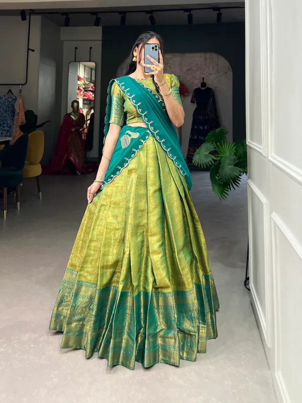 Experience_the_luxury_of_Kanjivaram_silk_in_this_regal_lehenga_choli_ensemble,_completed_with_a_flowing_embroidery_dupatta.