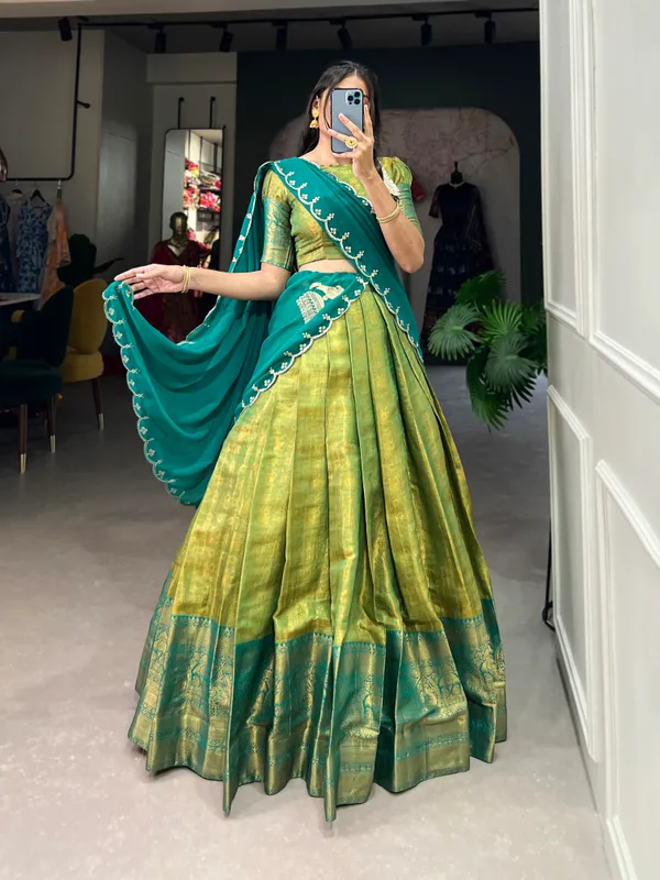 Experience_the_luxury_of_Kanjivaram_silk_in_this_regal_lehenga_choli_ensemble,_completed_with_a_flowing_embroidery_dupatta.