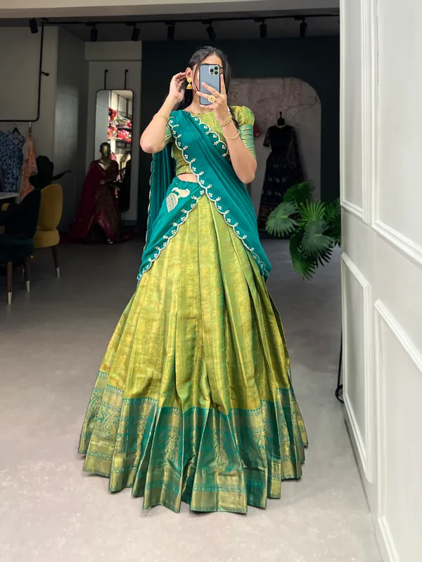 Experience_the_luxury_of_Kanjivaram_silk_in_this_regal_lehenga_choli_ensemble,_completed_with_a_flowing_embroidery_dupatta.