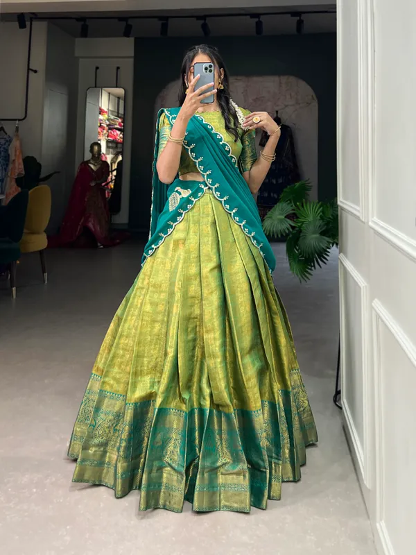Experience_the_luxury_of_Kanjivaram_silk_in_this_regal_lehenga_choli_ensemble,_completed_with_a_flowing_embroidery_dupatta.