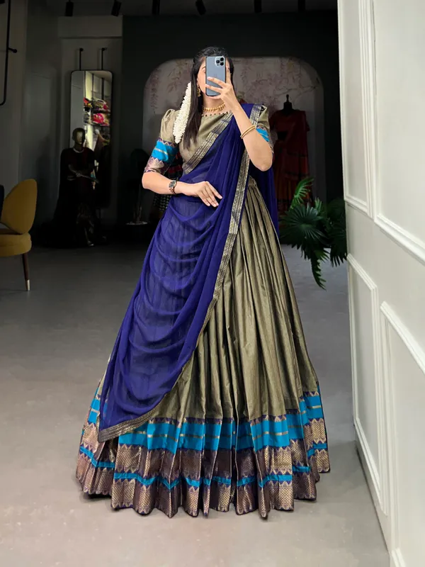 Immerse_Yourself_in_Tradition_with_Our_South_Style_Poly_Cotton_Half_Saree,_Paired_with_an_Elegant_Georgette_Dupatta??