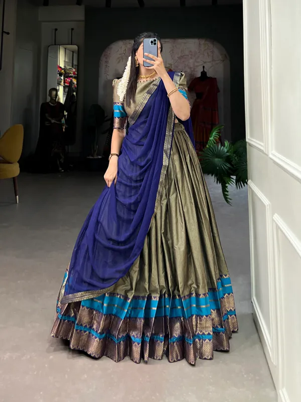 Immerse_Yourself_in_Tradition_with_Our_South_Style_Poly_Cotton_Half_Saree,_Paired_with_an_Elegant_Georgette_Dupatta??