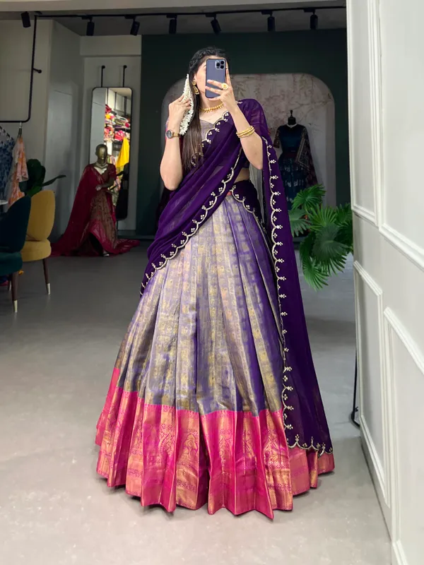 Experience_the_luxury_of_Kanjivaram_silk_in_this_regal_lehenga_choli_ensemble,_completed_with_a_flowing_embroidery_dupatta.