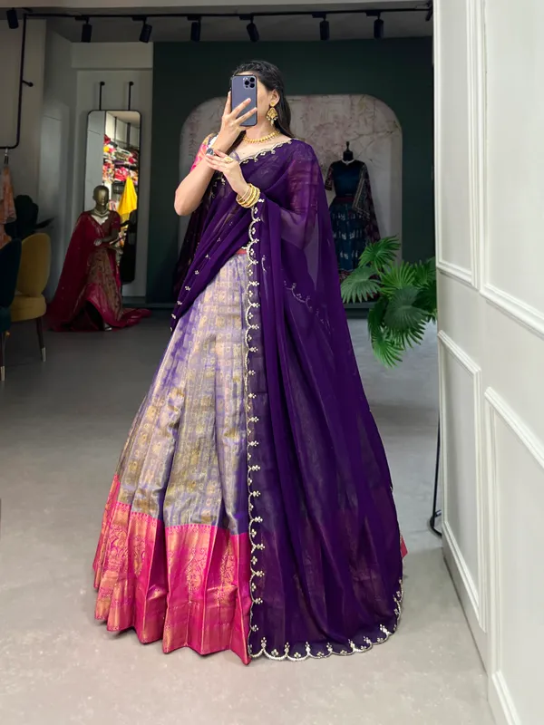 Experience_the_luxury_of_Kanjivaram_silk_in_this_regal_lehenga_choli_ensemble,_completed_with_a_flowing_embroidery_dupatta.