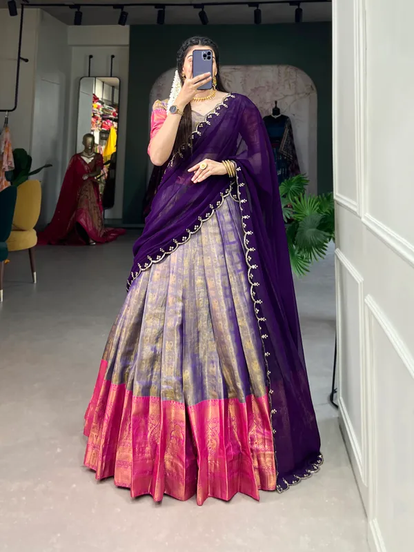 Experience_the_luxury_of_Kanjivaram_silk_in_this_regal_lehenga_choli_ensemble,_completed_with_a_flowing_embroidery_dupatta.