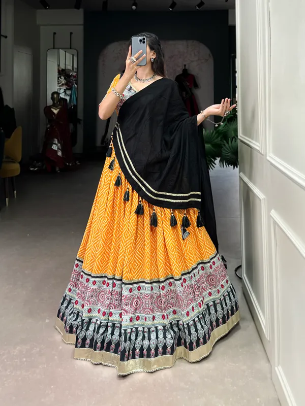 Celebrate_the_divine_with_a_swirl_of_Bandhej_and_Ajrakh_prints._Your_Navratri,_your_style