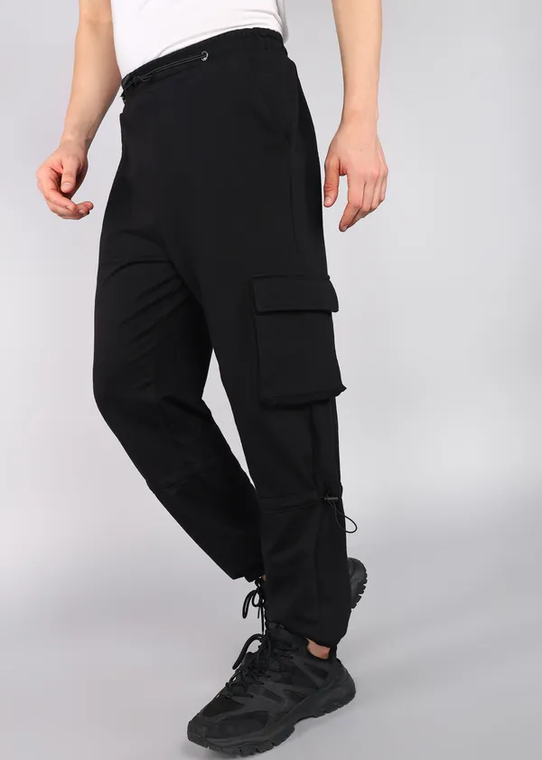 Black_Tapered_Fit_Knitted_Cargos_For_Men_With_Biowashed_Loopknit_Cotton_Fabric