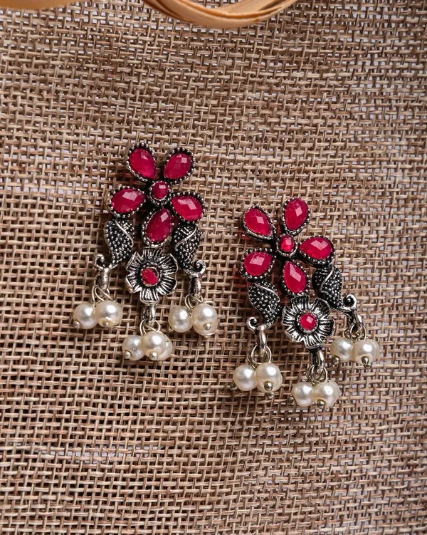 Oxidized_Silver-Toned_Floral_Stud_Earrings_with_Ruby_Stones_and_Pearl_Drops