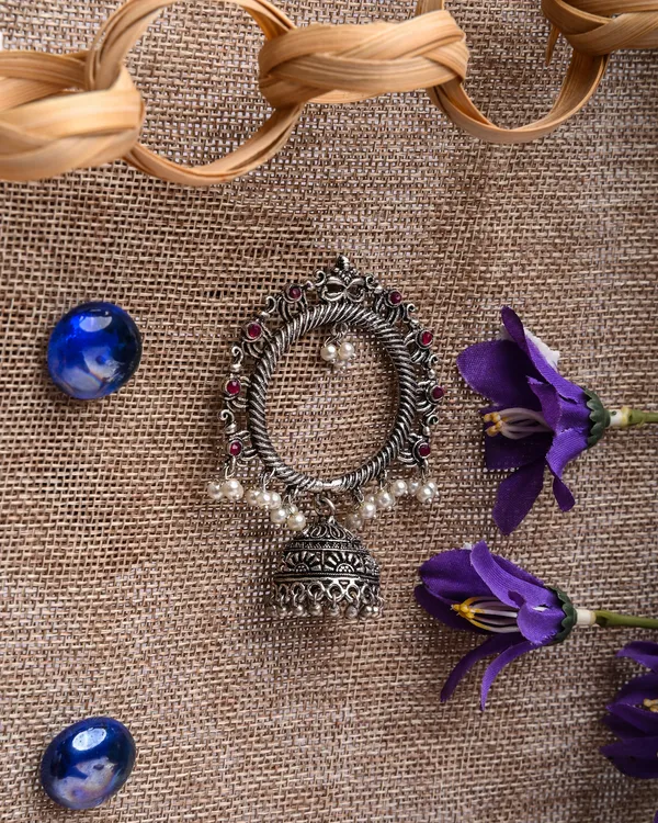 Grand_Oxidized_Silver-Toned_Circular_Jhumka_with_Red_Stones_and_Carved_Motif
