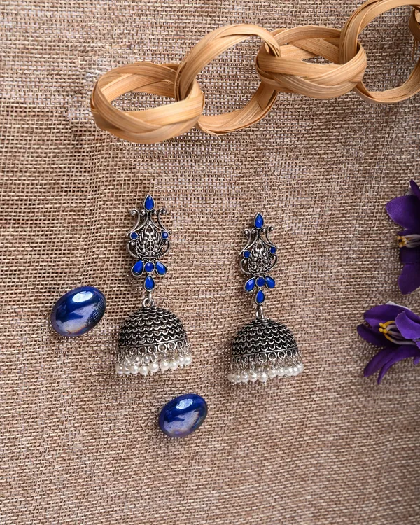 Oxidized_Silver-Toned_Peacock_Jhumka_Earrings_with_Sapphire_Blue_Stones