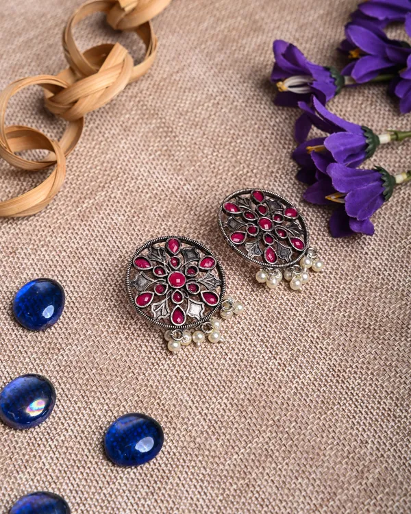 Oxidized_Silver-Toned_Floral_Stud_Earrings_with_Ruby_Stones_and_Pearl_Drops