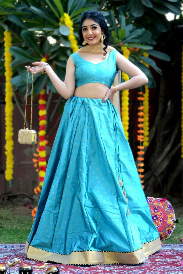 Teal_Blue_Silk_Lehenga_with_Net_Dupatta_and_Unstitched_Blouse