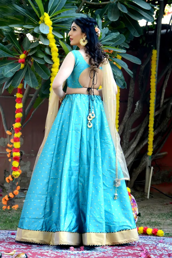 Teal_Blue_Silk_Lehenga_with_Net_Dupatta_and_Unstitched_Blouse