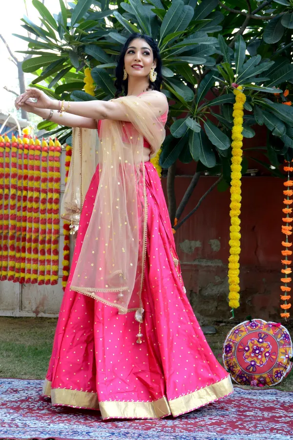 Pink_Silk_Lehenga_with_Net_Dupatta_and_Unstitched_Blouse