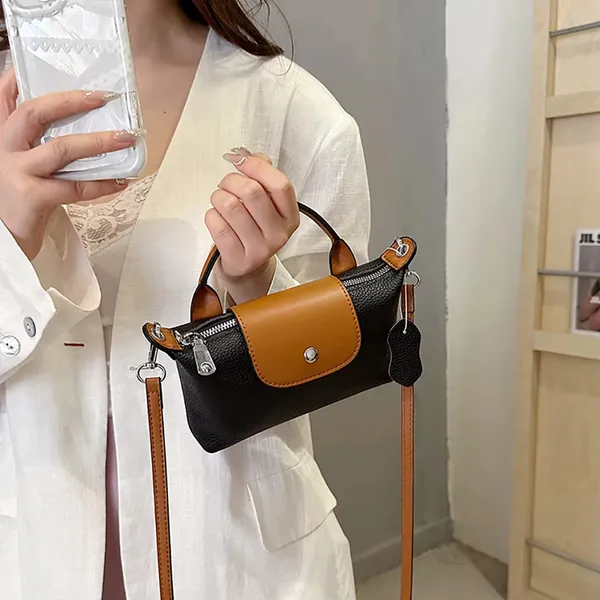 Black_Women_S_Pu-_Leather_Crossbody_Wing_Bag_-_Casual,_Fashionable,_Lightweight_And_Portable