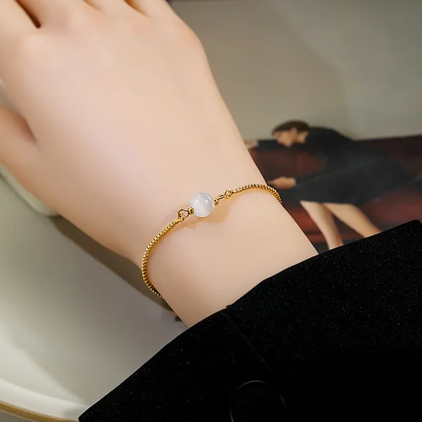 Anti_Tarnish_gold_draw_pearl_zircon_Stainless_Steel_bracelet_For_Girls_&_Women,_Stylish_Western_wear