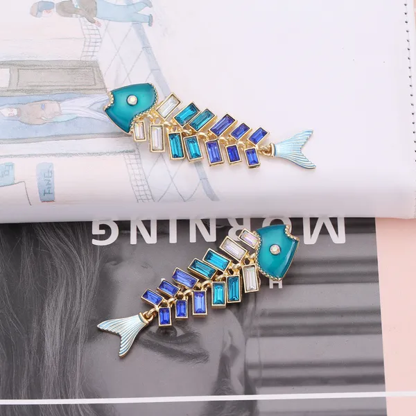 Blackbox_Jewelleries:_Statement_Tropical_Fish_Bone_Earrings_|_Colorful_Drip_Oil_Crystal_Fish_Tail_Dangles