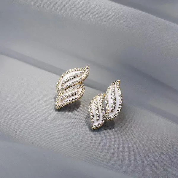 Black_colour_Wave_Leaf_Shape_Stud_embolished_with_golden_Zircon_for_women_&_girls,_Stylish,_Fashionable,_Korean_Jewelry