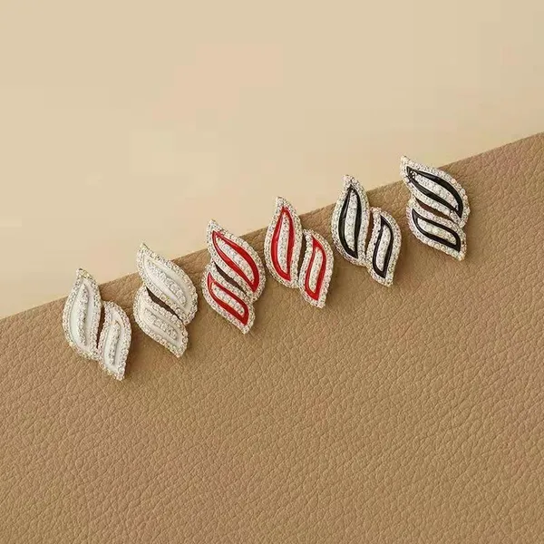 Black_colour_Wave_Leaf_Shape_Stud_embolished_with_golden_Zircon_for_women_&_girls,_Stylish,_Fashionable,_Korean_Jewelry