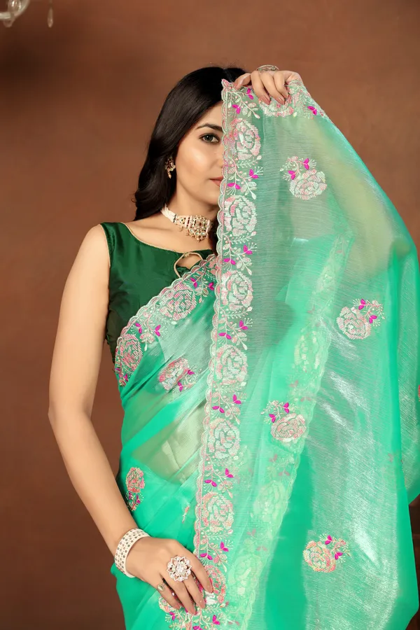 Elegant_Green_Embroidered_Saree_With_Unstitched_Blouse_Piece