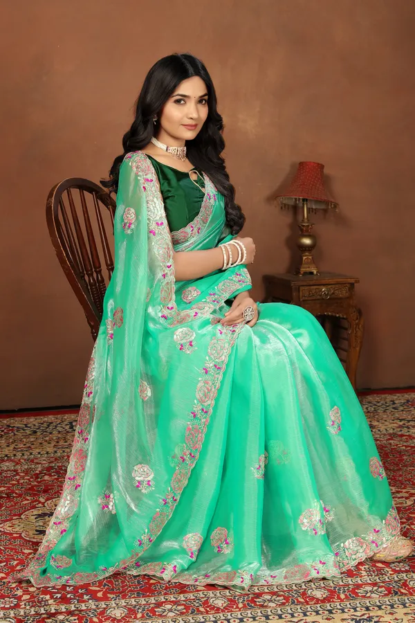 Elegant_Green_Embroidered_Saree_With_Unstitched_Blouse_Piece