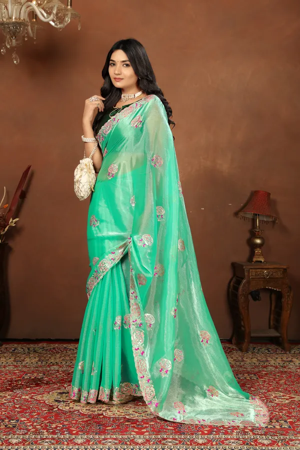 Elegant_Green_Embroidered_Saree_With_Unstitched_Blouse_Piece