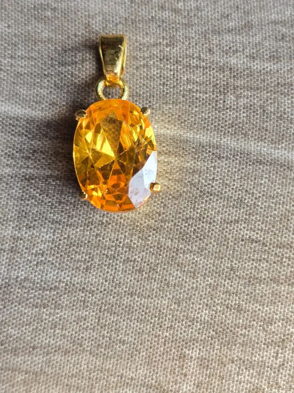 Yellow_Sapphire_Pukhraj_Gemstone_Brass_Metal__Pendant_Astrological_Purpose_For_Unisex