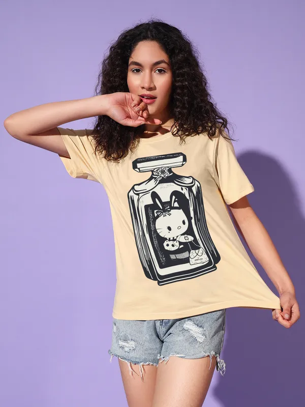 Women's_Beige_T-Shirt_with_Perfume_Bottle_Cat_Graphic_Print_|_Trendy_Casual_Look