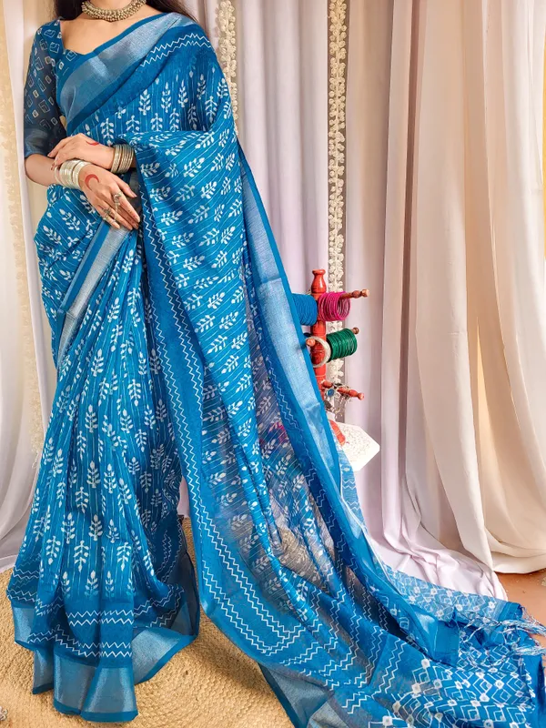 Elegant_Blue_Pure_Linen_Saree_with_Tassels_and_White_Floral_Patterns