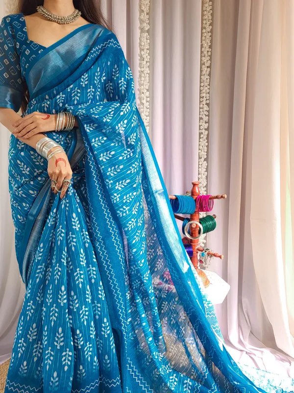 Elegant_Blue_Pure_Linen_Saree_with_Tassels_and_White_Floral_Patterns