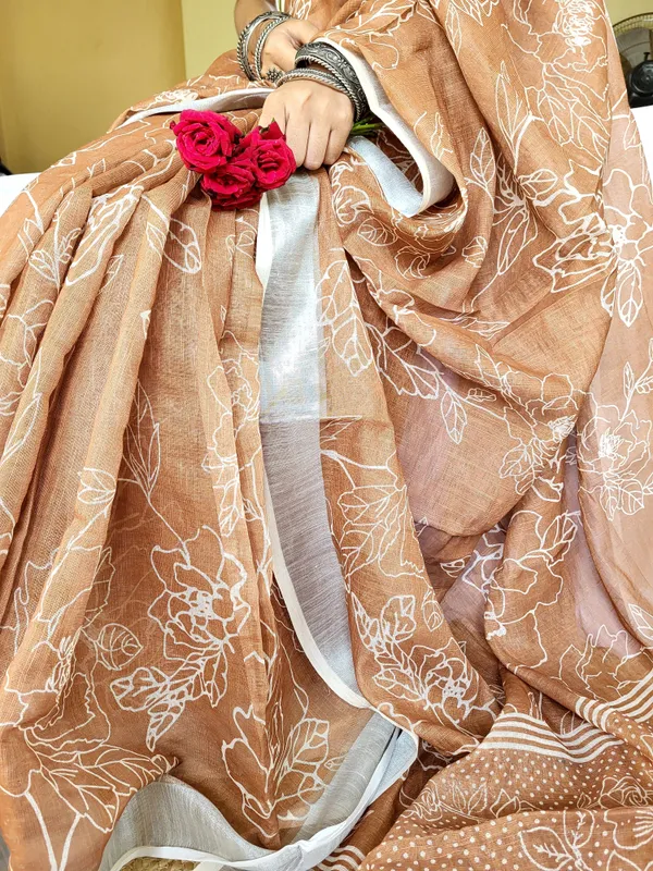 Rust_Brown_Pure_Linen_Saree_with_White_Floral_Motifs_and_Tassel_Detailing