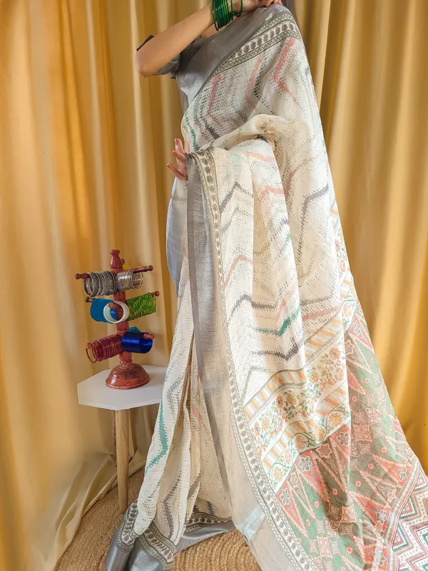 Elegant_Beige_Pure_Linen_Saree_with_Multicolor_Zigzag_Design_and_Tassel_Finish