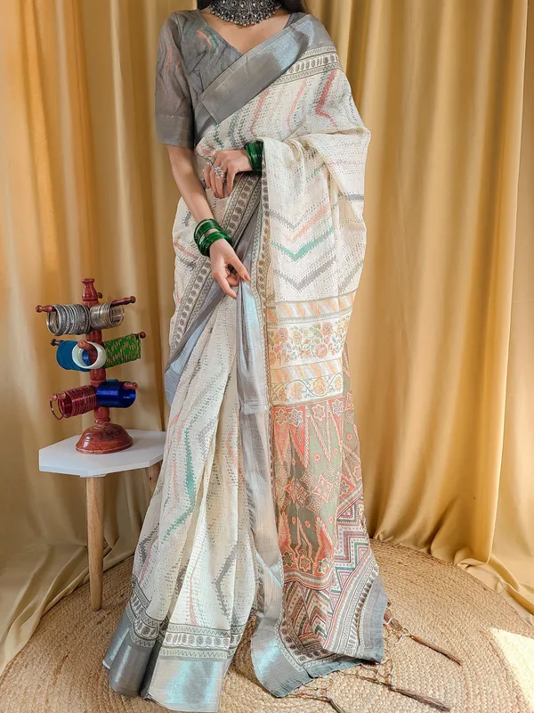 Elegant_Beige_Pure_Linen_Saree_with_Multicolor_Zigzag_Design_and_Tassel_Finish
