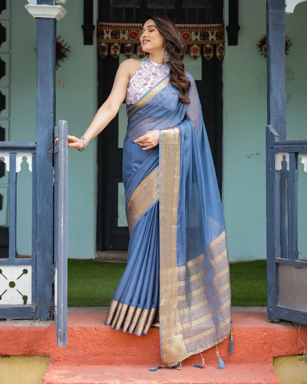 Serene_Steel_Blue_Plain_Chiffon_Saree_with_Gold_Zari_Border,_Floral_Printed_Blouse_&_Tassel_Detailing