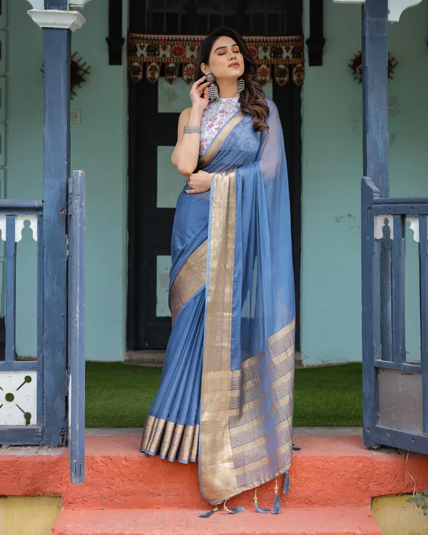 Serene_Steel_Blue_Plain_Chiffon_Saree_with_Gold_Zari_Border,_Floral_Printed_Blouse_&_Tassel_Detailing