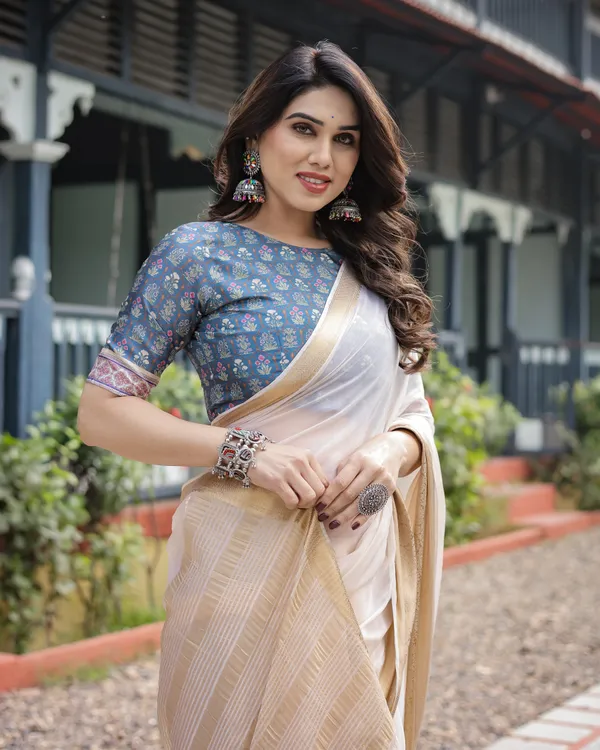 Ivory_White_Plain_Chiffon_Saree_with_Gold_Zari_Border,_Floral_Printed_Blouse_&_Tassel_Detailing