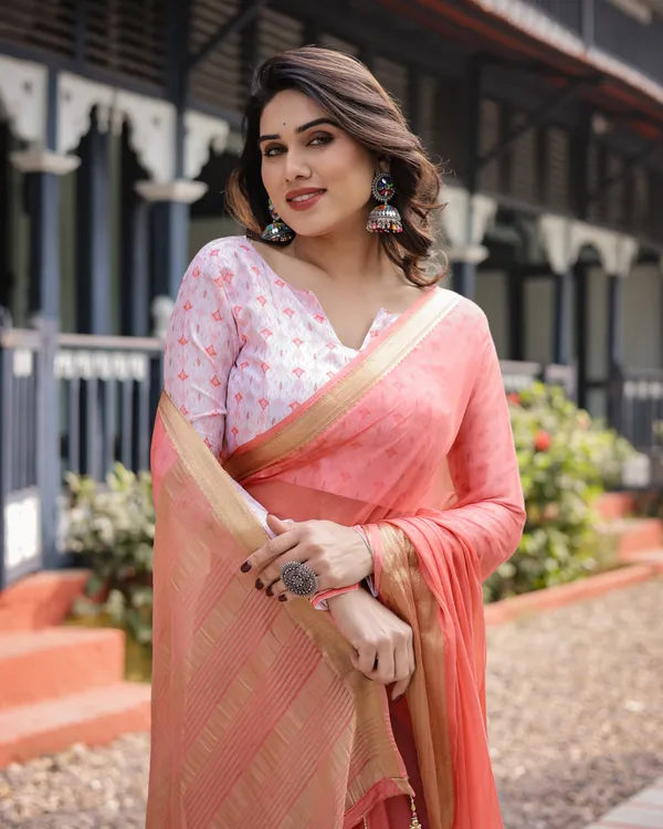 Peach_Pink_Plain_Chiffon_Saree_with_Gold_Zari_Border,_Geometric_Printed_Blouse_&_Tassel_Detailing