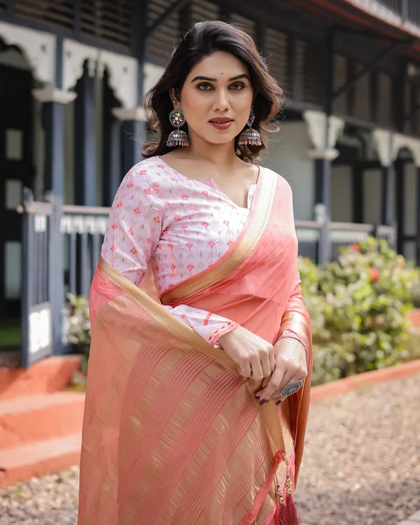 Peach_Pink_Plain_Chiffon_Saree_with_Gold_Zari_Border,_Geometric_Printed_Blouse_&_Tassel_Detailing