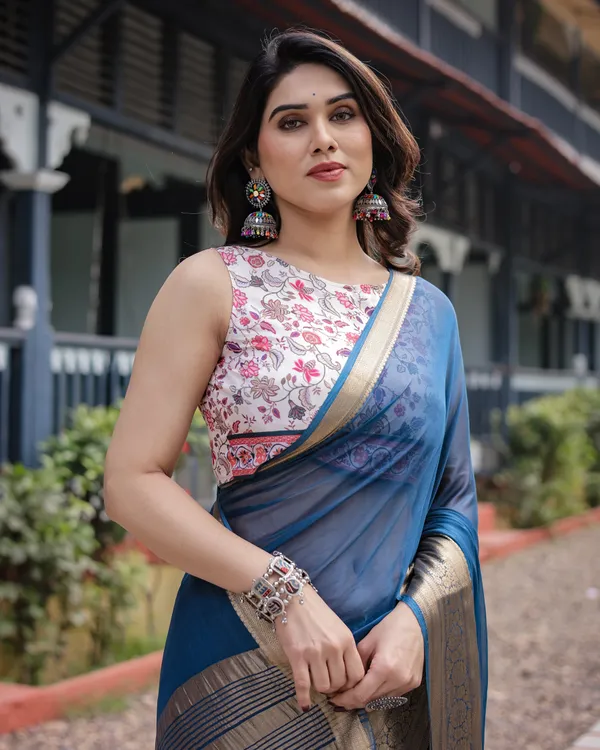 Deep_Navy_Blue_Plain_Chiffon_Saree_with_Gold_Zari_Border,_Floral_Printed_Blouse_&_Tassel_Accents