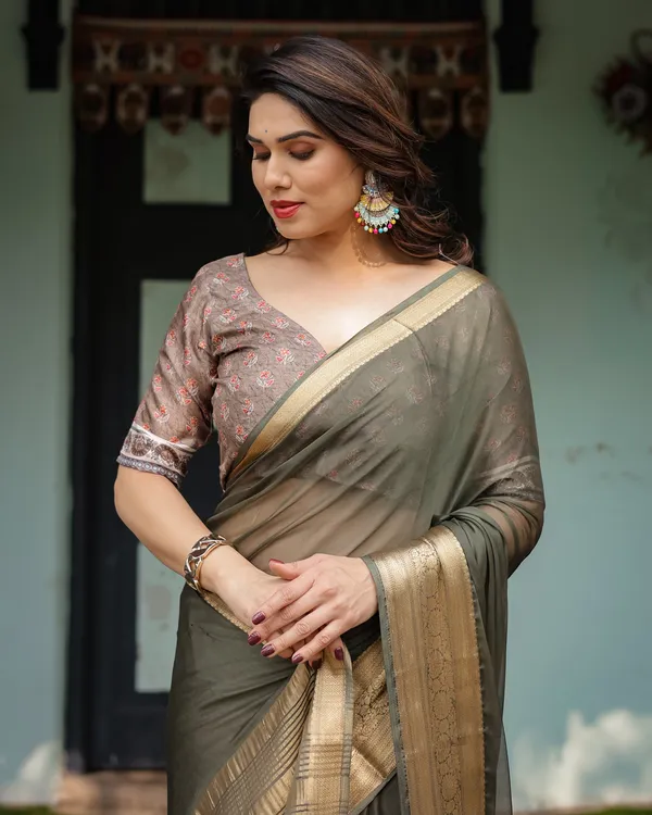 Elegant_Olive_Green_Plain_Chiffon_Saree_with_Gold_Zari_Border,_Floral_Printed_Blouse_&_Tassel_Detailing