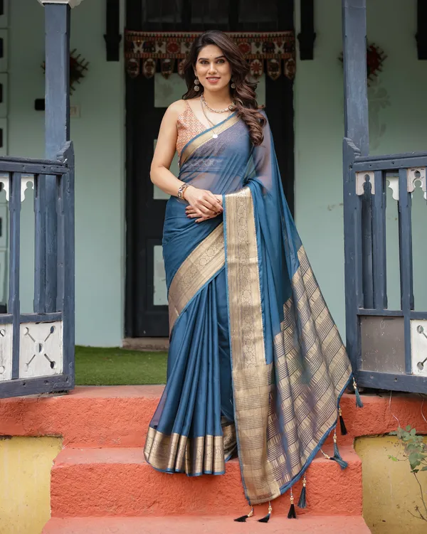 Teal_Blue_Plain_Chiffon_Saree_with_Gold_Zari_Border,_Geometric_Printed_Blouse_&_Tassel_Detailing