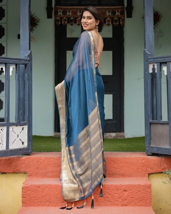 Teal_Blue_Plain_Chiffon_Saree_with_Gold_Zari_Border,_Geometric_Printed_Blouse_&_Tassel_Detailing