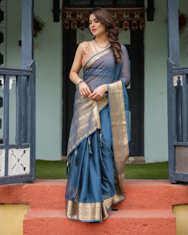 Teal_Blue_Plain_Chiffon_Saree_with_Gold_Zari_Border,_Geometric_Printed_Blouse_&_Tassel_Detailing