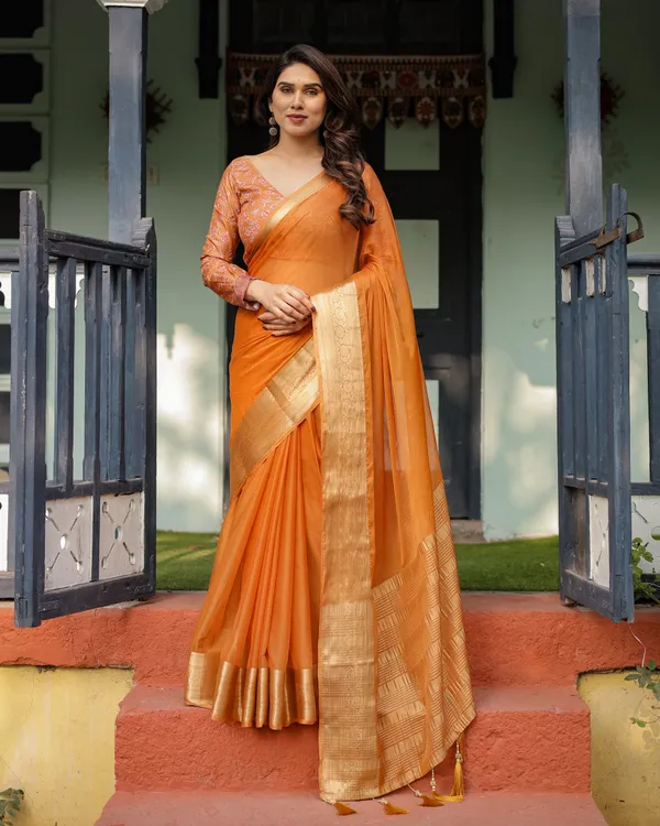 Sunset_Orange_Plain_Chiffon_Saree_with_Gold_Zari_Border,_Floral_Embroidered_Blouse_&_Tassel_Detailing