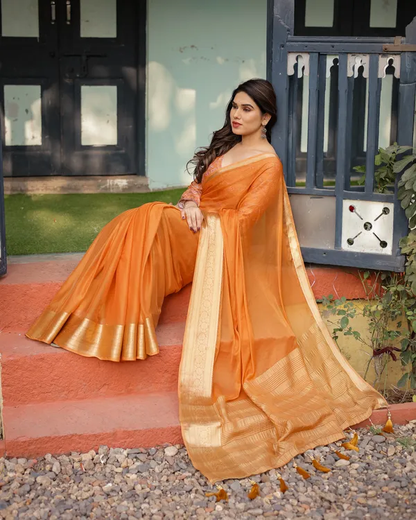 Sunset_Orange_Plain_Chiffon_Saree_with_Gold_Zari_Border,_Floral_Embroidered_Blouse_&_Tassel_Detailing