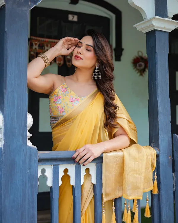 Golden_Yellow_Plain_Chiffon_Saree_with_Gold_Zari_Border,_Floral_Printed_Blouse_&_Tassel_Detailing