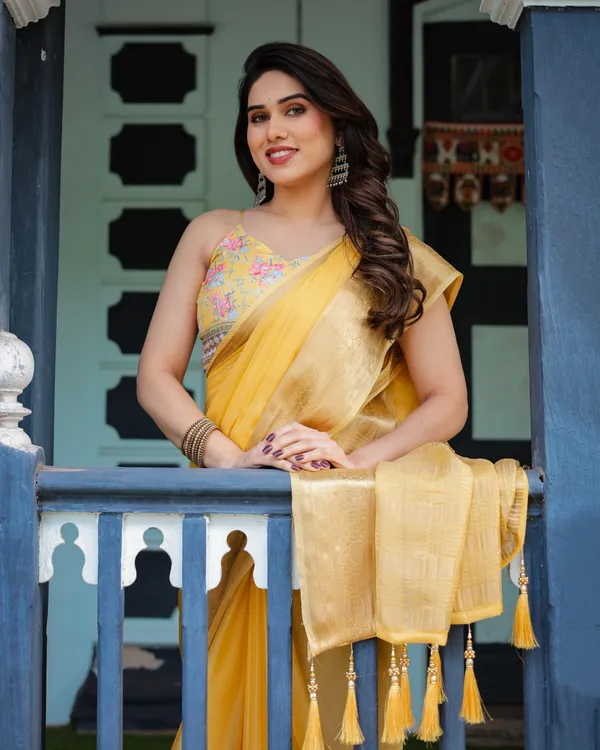 Golden_Yellow_Plain_Chiffon_Saree_with_Gold_Zari_Border,_Floral_Printed_Blouse_&_Tassel_Detailing