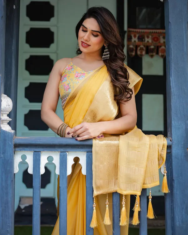 Golden_Yellow_Plain_Chiffon_Saree_with_Gold_Zari_Border,_Floral_Printed_Blouse_&_Tassel_Detailing