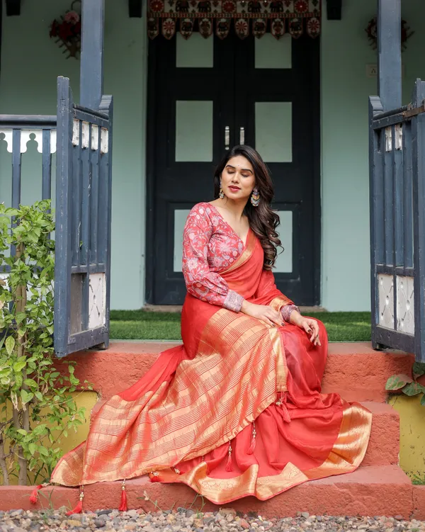 Fiery_Red_Plain_Chiffon_Saree_with_Gold_Zari_Border,_Full-Sleeve_Floral_Blouse_&_Tassel_Detailing